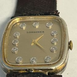 vintage Longines 10K gold-filled cushion-shaped watch  brown Lizard strap and diamond hour markers