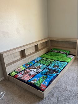 Twin Floor bed with bookcase