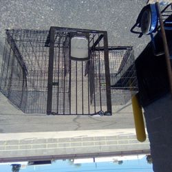 Dog Kennels And Baby Gate With Doggy Door