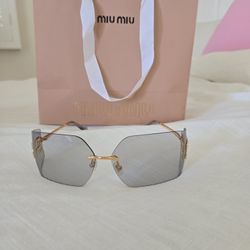 Miu Miu Irregular sunglasses 