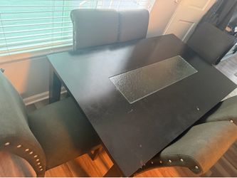 Table , 6 chairs still in good condition.