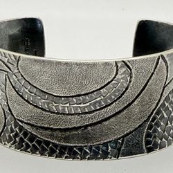 Authentic Navajo Handcrafted Sterling Silver Cuff Bracelet by artist Monty Claw