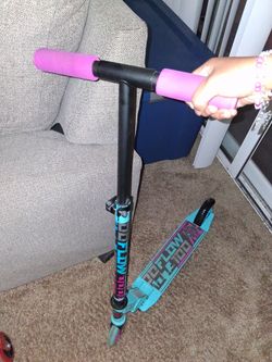 Pink and blue kid scooter