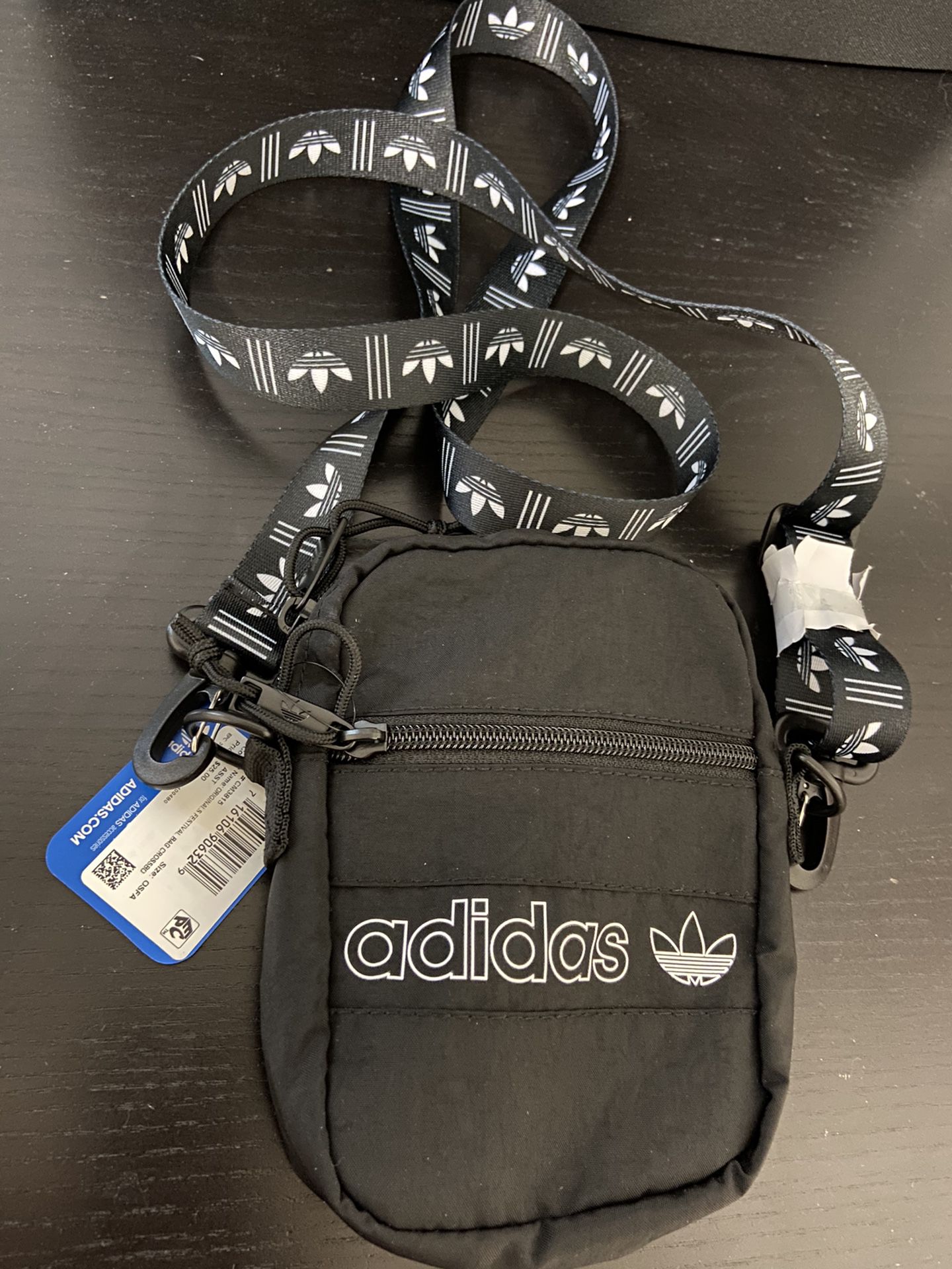 Free Adidas cross body bag with shoes purchase.