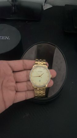 Citizen Gold Tone Watch with Bezel