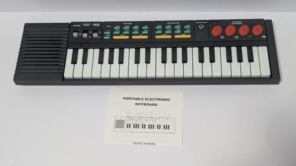 Vintage 32-Key Portable Electronic Keyboard Hing Hon EK-001  + Manual