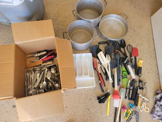 3 large pots, lots of flatware and kitchen utensils