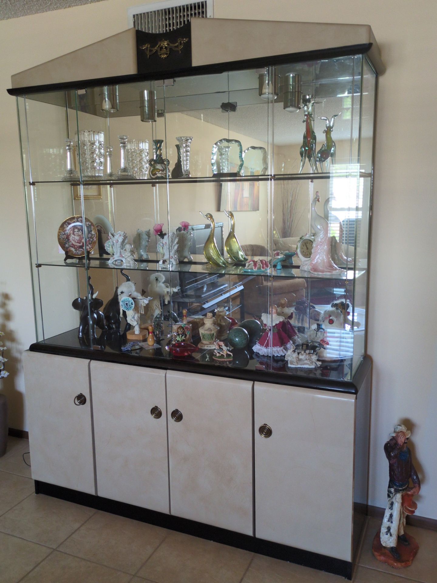 Curio cabinet. Sleek!