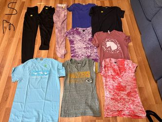 Variety of woman’s clothes in a size small