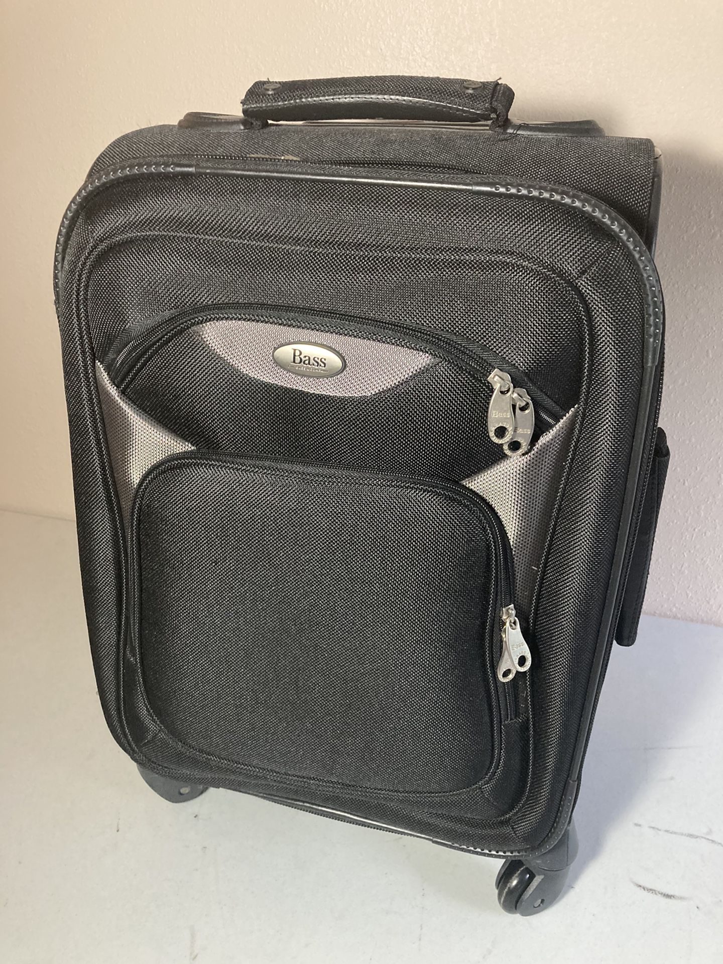 Black carry on luggage (GH Bass & Co)