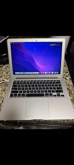 MacBook Air 13 in with charger I can deliver