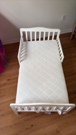Toddler bed with breathable mattress.