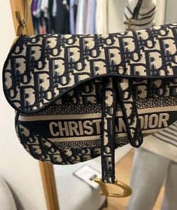 Christian Dior
Oblique Embroidered Saddle Bag Blue