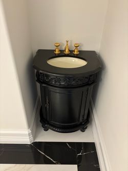 Black Victorian Bathroom Vanity with Gold Faucet
