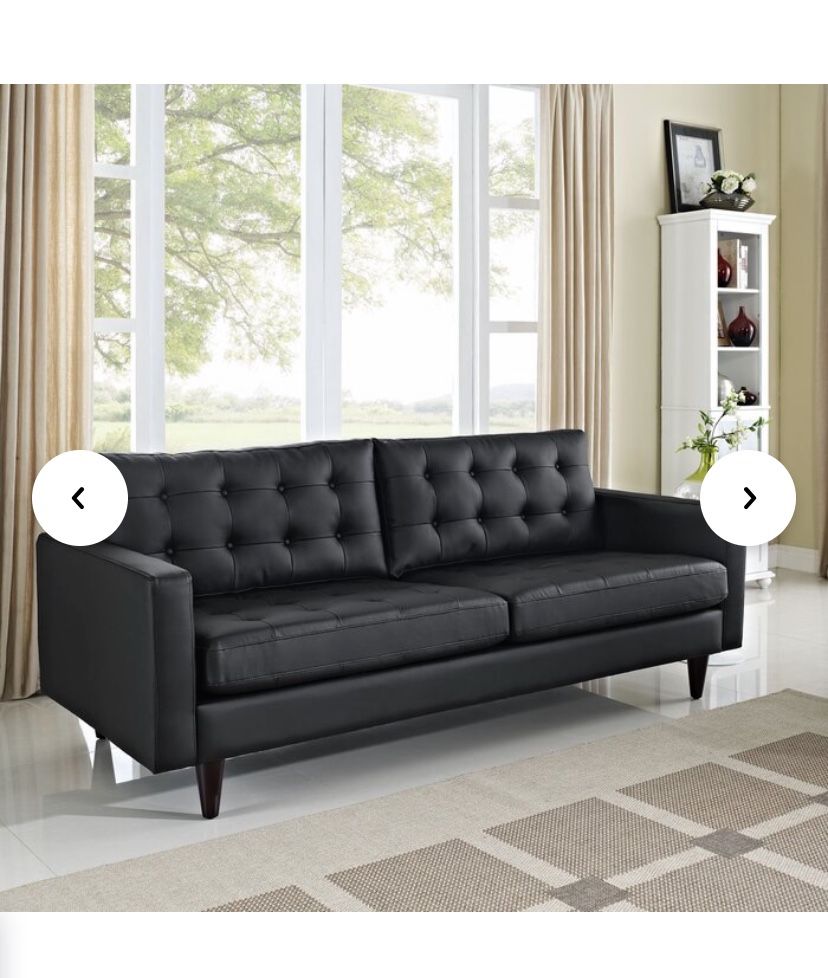 Black Couch (adjusts to become bed)