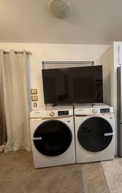 Brand new Samsung washing machine and dryer