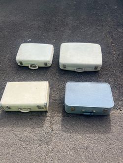 4 Vintage suit cases