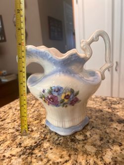 Beautiful Ceramic White & Blue Pitcher with Colorful Floral Pattern and Elegant Handle. Also can be used as a vase or planter.