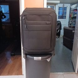 SAMSONITE Black Rolling Suitcase.  25" (H) X18" (L) X10" (D)