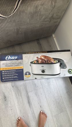 Oster 20 quart large self basting roaster oven with defrost capabilities