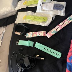 Fitbit With 5 bands, and 2 Chargers