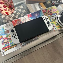 Nintendo Switch Oled + 4 games
