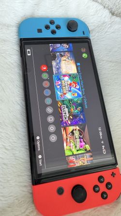 Nintendo Switch with Neon Blue and Neon Red Joy Con
