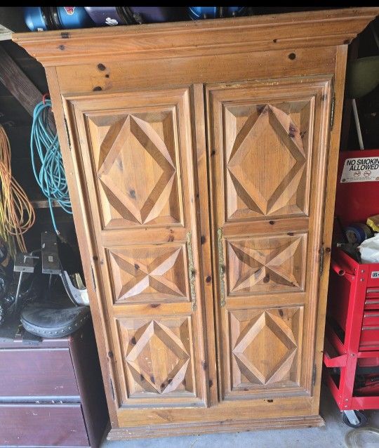 Large Wooden Cabinet With Carved Front Doors