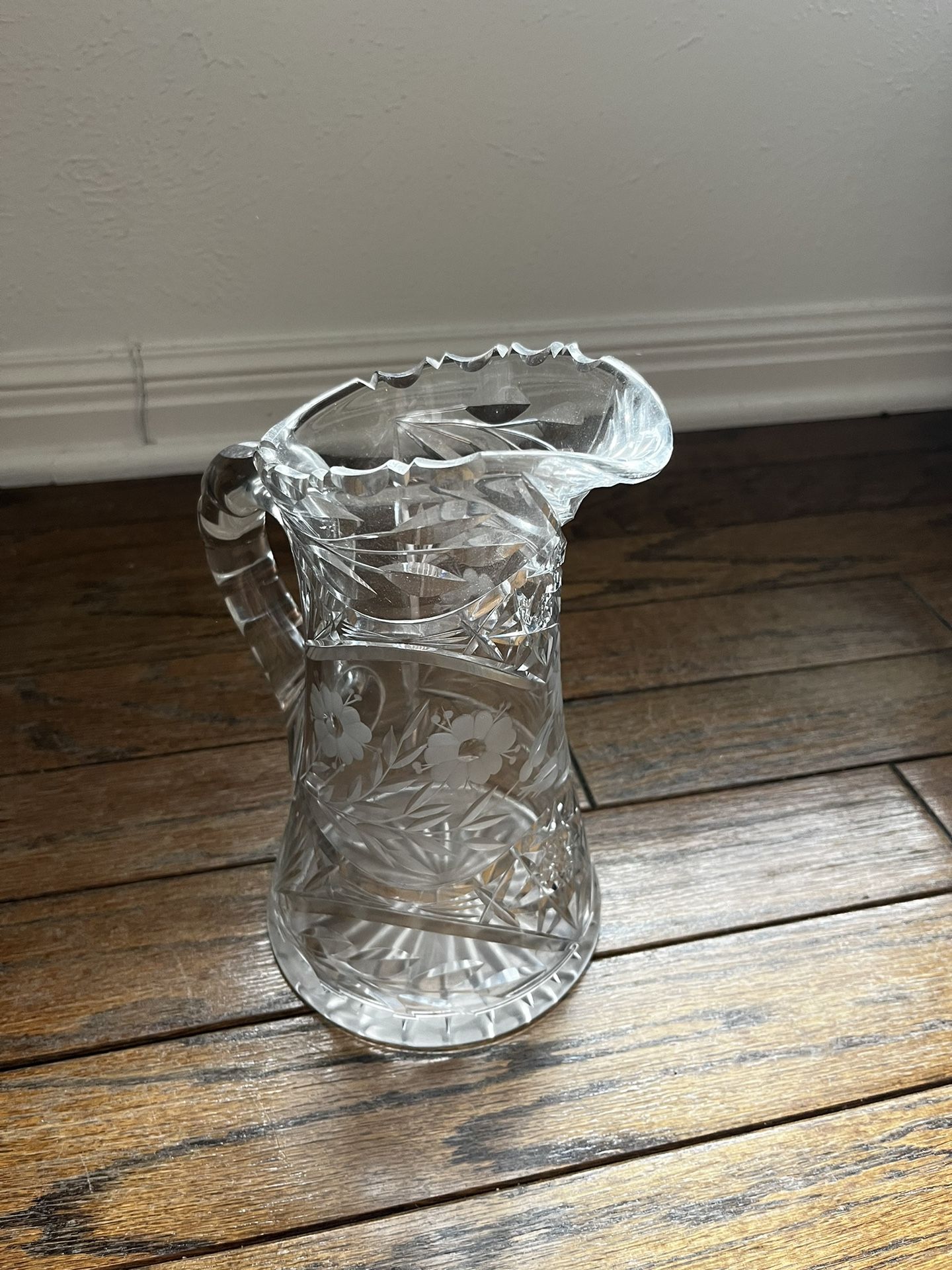 Antique cut glass carved pitcher