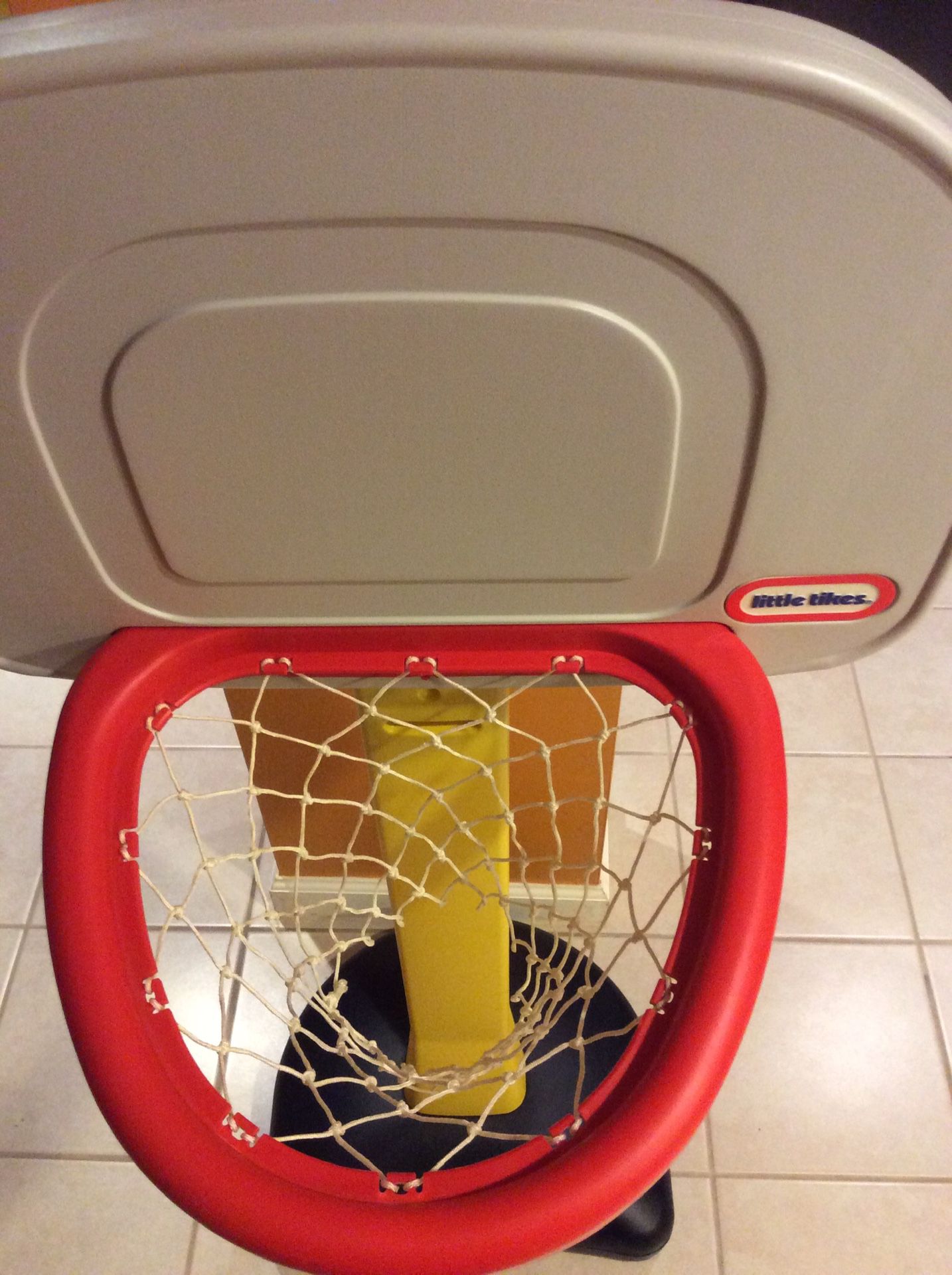 Adjustable basketball hoop. Indoor use only.