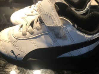White and black puma shoes size 8