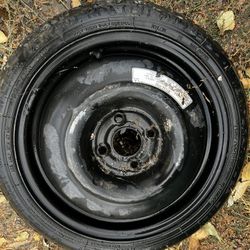 125/70 Spare Tire 4 Lug Rim