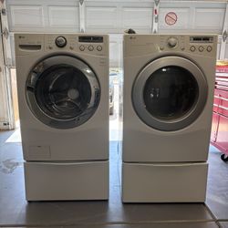 LG Front Load Washing Machine And Dryer With Pedestals