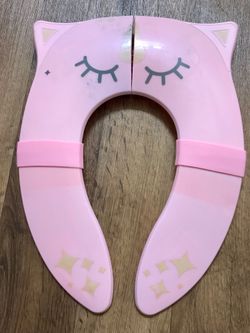 Travel potty seat for toddlers