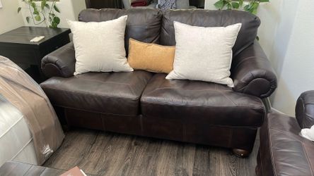 Brown leather sofa + love seat