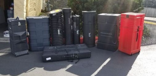 Various Hard Cases, most with wheels, locks, etc.