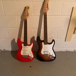 Two Electric Guitars With No Wires 