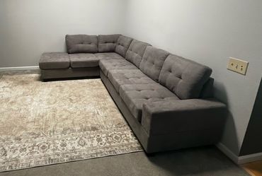 Sectional with storage ottoman