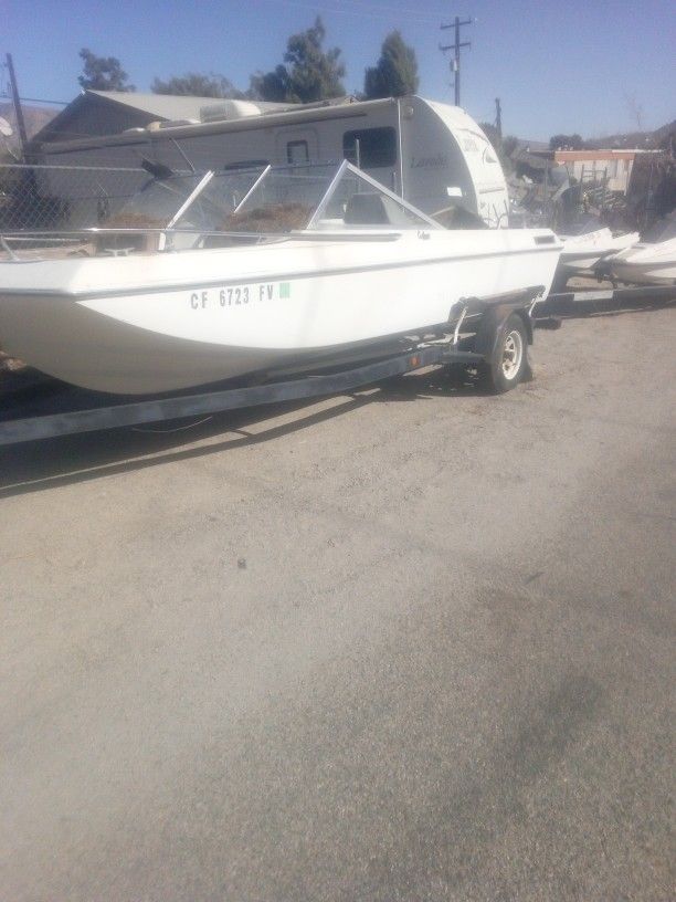 2 Jet Skiis And A Boat With Trailers For $1500
