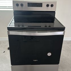 BRAND NEW!! Never Used! WhirlpoolElectric Range + Microwave .  READY FPR PICKUP! 