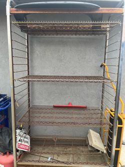 Metal storage rack with 4 shelves