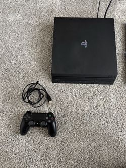 PS4 with Wireless DS Controller and 6 Games