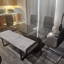 Contemporary Dining Table And Chairs