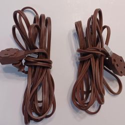 Two indoor 15 foot extension cords 2 prong with 3 outlets