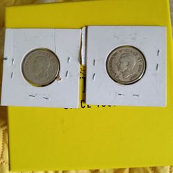 2 silver Canadian quarters