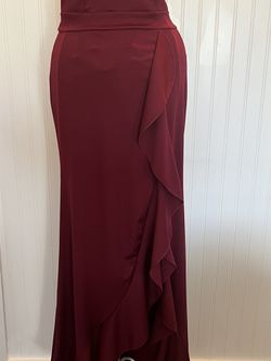 Beautiful wine color party dress Size S The fabric stretches Thumbnail