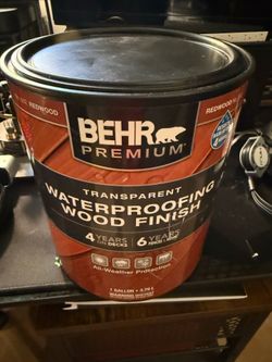 1 Gallon Behr waterproofing wood finish transparent Redwood color.