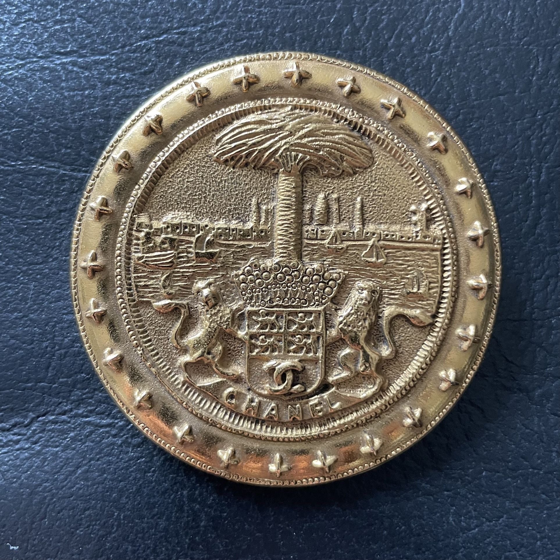 Vintage Chanel brooch that measures 2 3/8 inches in diameter and can be seen in South Beach, Miami Beach. 