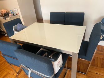 Jensen and Lewis extendable dining table with 6 navy denim chairs