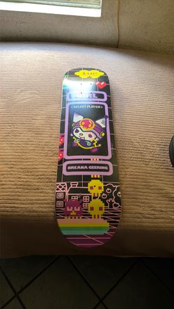 Girl skateboard Breana geering hello kitty and friends